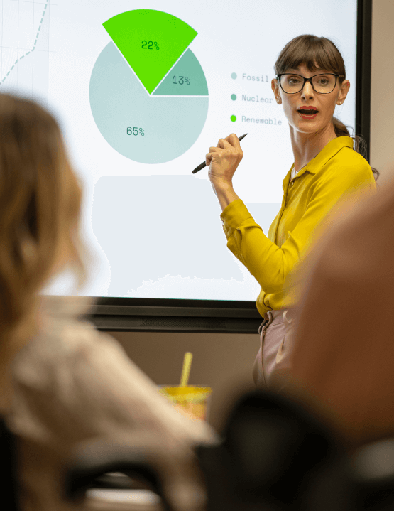 Business strategist presenting to a team in a modern office, discussing digital transformation strategies, data-driven insights, and actionable roadmaps.